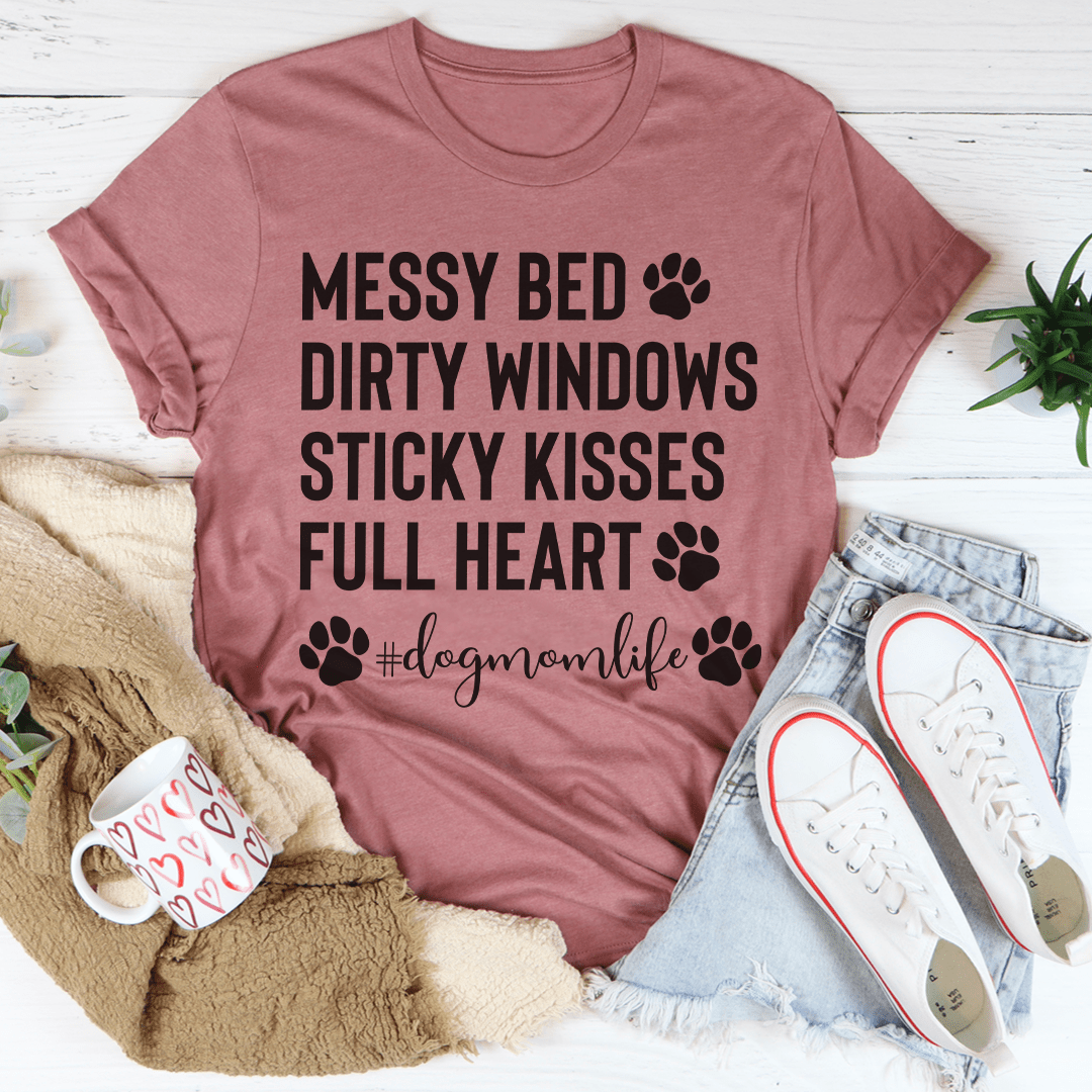 Peach-colored Dog Mom Life T-shirt by MerchMallow featuring a casual fit and playful dog-themed graphic design.