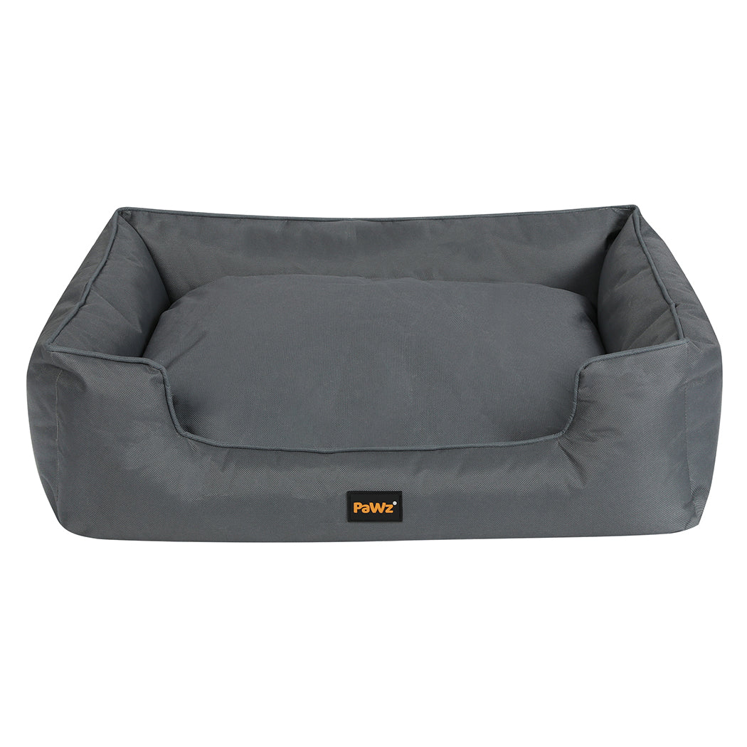 NNEIDS Pawz waterproof pet dog calming bed with plush fabric and raised edges for comfort and security.