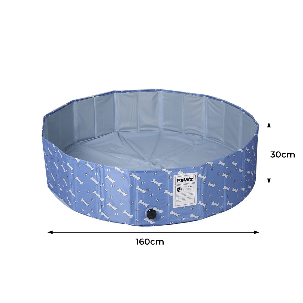 Foldable dog swimming pool by IDropship, portable pet paddling pool with blue waterproof fabric for dogs to cool off and play outdoors.