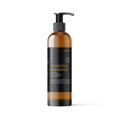 Essential Dog Sensitive Dog Shampoo with chamomile, sweet orange, and rosewood for gentle pet cleaning.