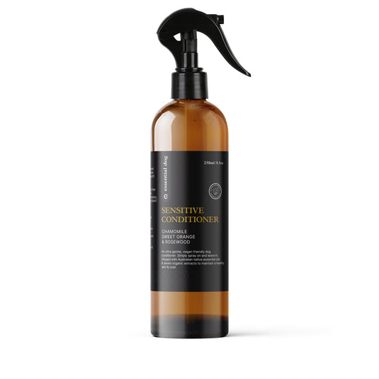 Essential Dog Sensitive Dog Conditioner with chamomile, sweet orange, and rosewood, showing a bottle of gentle dog wash.