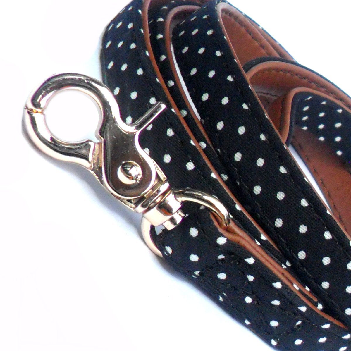 Close-up of Prince&Princess polka dot fabric dog lead with faux leather accents, showcasing vibrant pattern and sturdy construction.