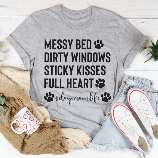 Peach-colored Dog Mom Life T-shirt by MerchMallow featuring a casual, comfortable design with dog-themed graphics.
