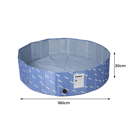 Foldable dog swimming pool by IDropship, portable pet paddling pool with blue waterproof fabric for dogs to cool off and play outdoors.